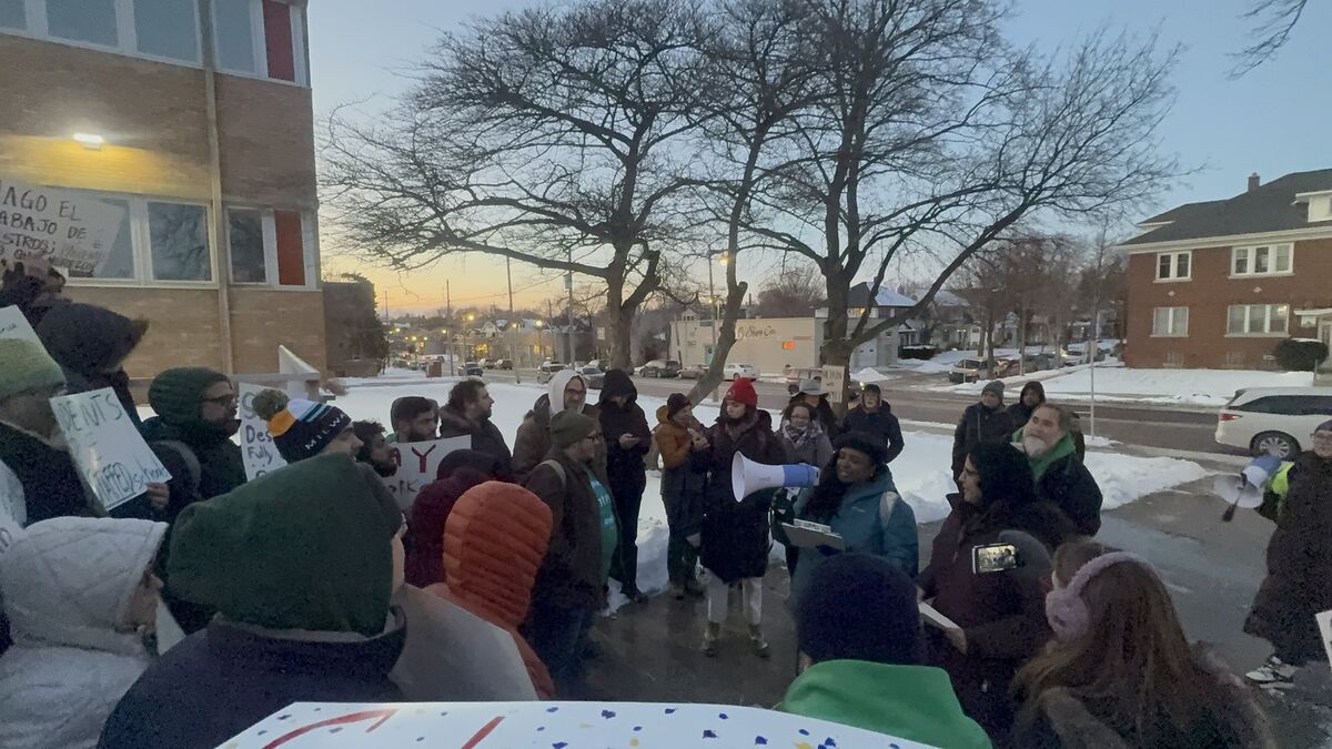 Community members gathered outdoors for a neighborhood event