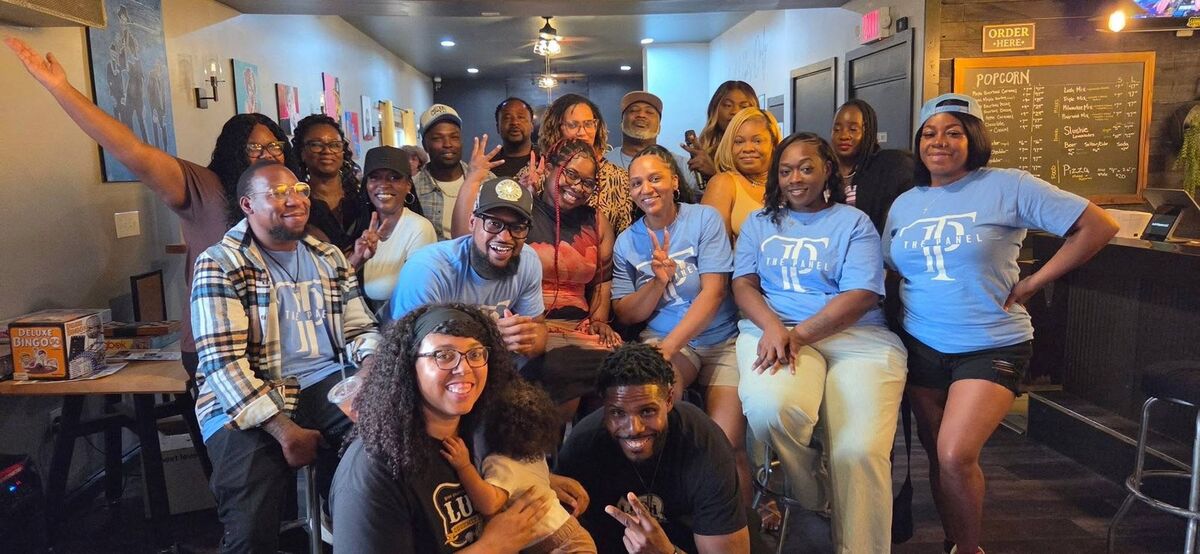 A large group celebrating together at a community gathering