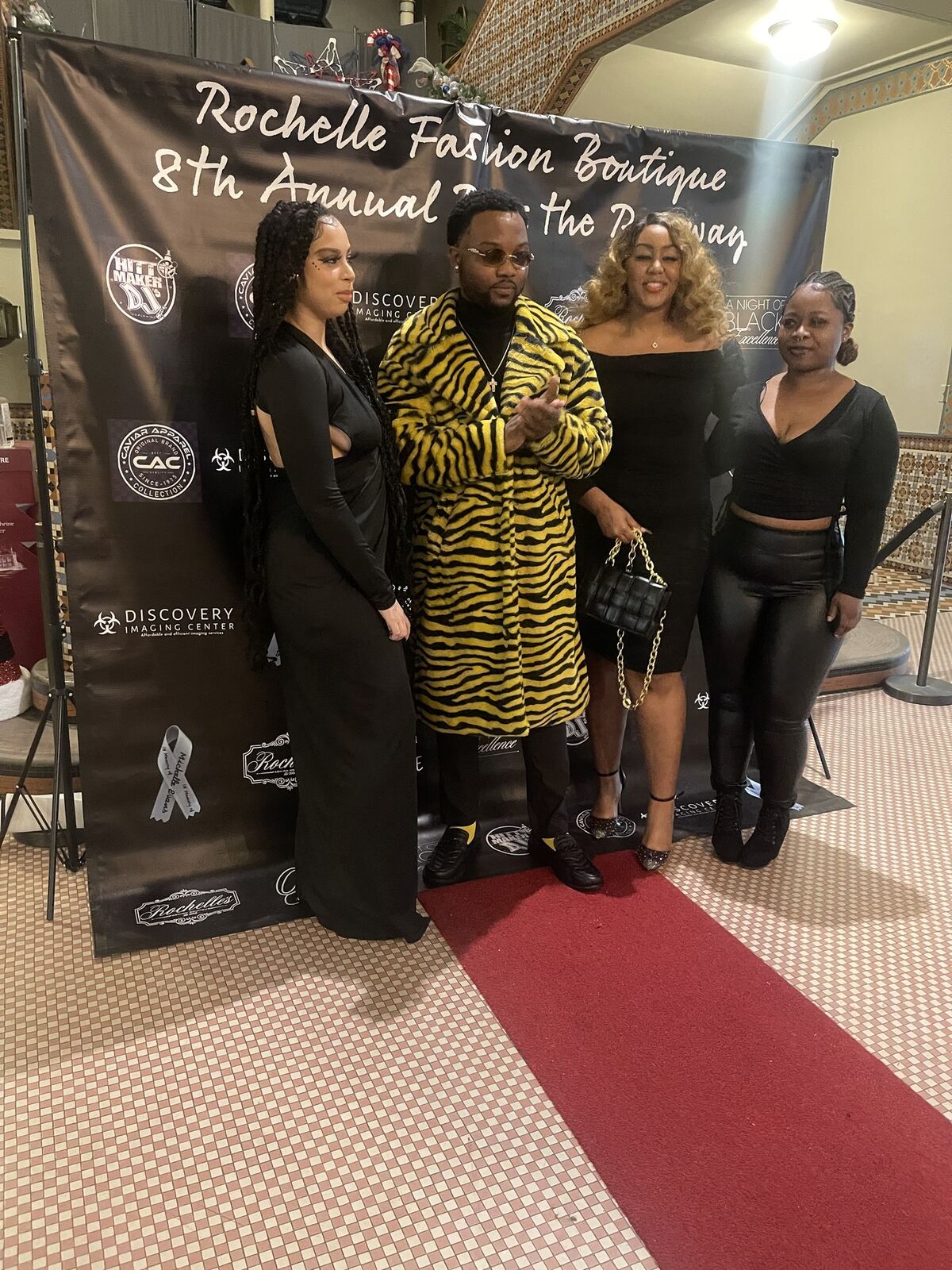 Kay Kay with guests at Rochelle&rsquo;s fashion show