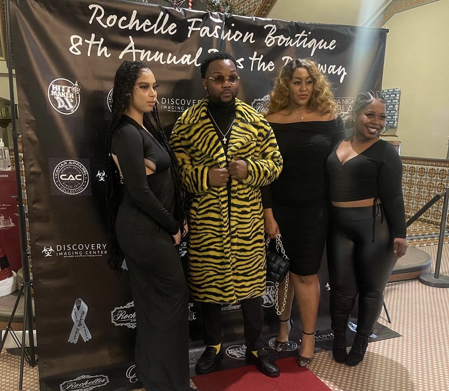 Community members posing together at a Milwaukee event